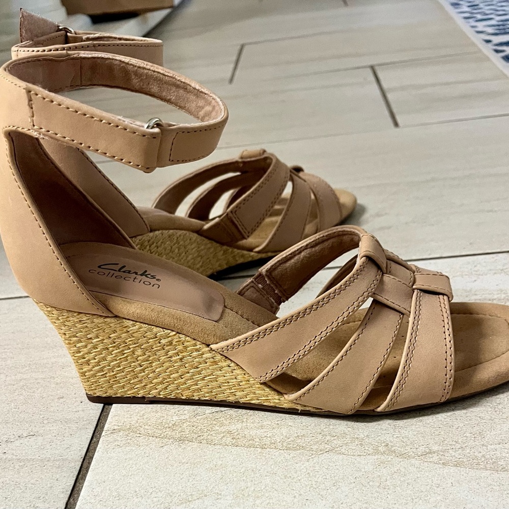 Clark’s tan wedge sandals
9